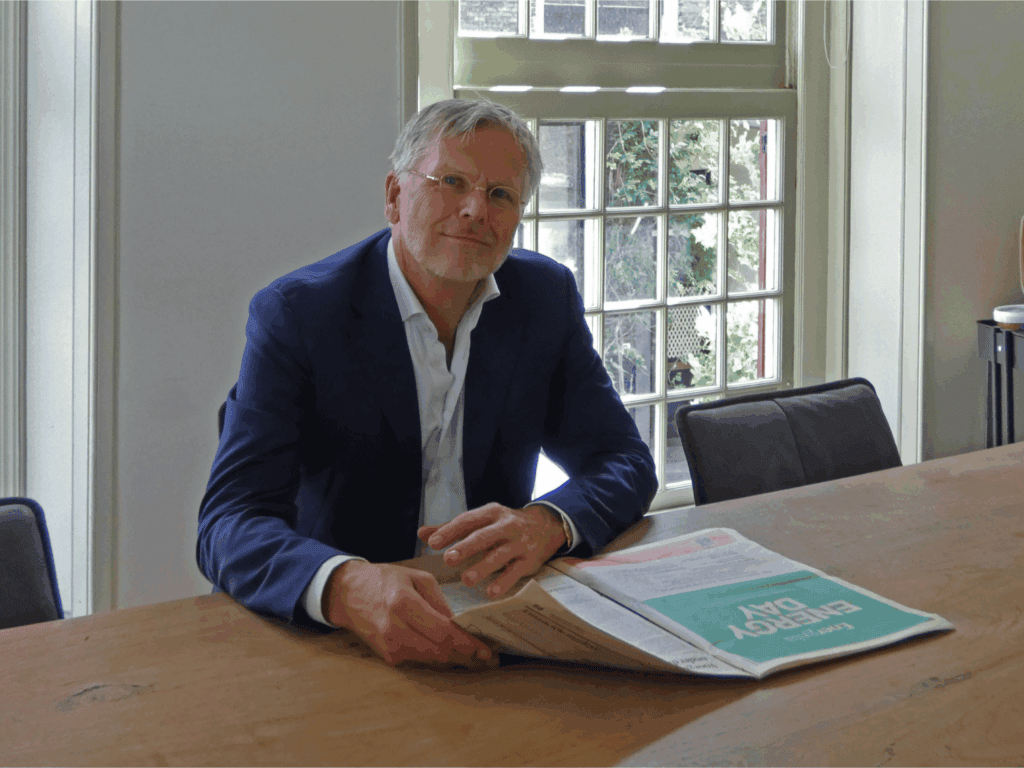 Michiel, owner of review tracking, reading the newspaper in the office